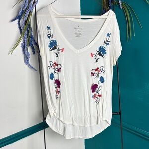 White embroidered American Eagle T-shirt.